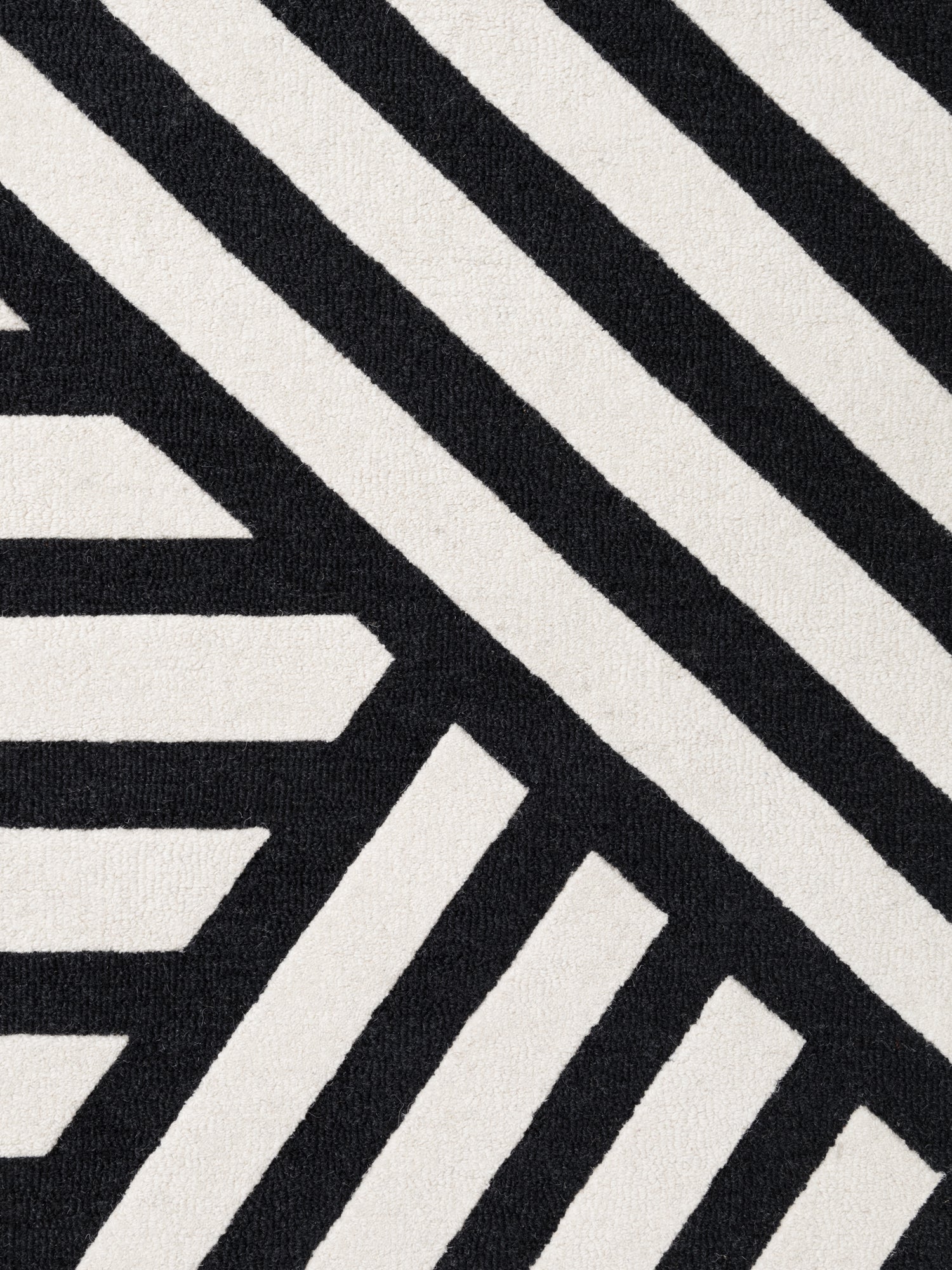 ELLE DECORATION STRYVE ULDTÆPPE NOIR, SORT-HVID