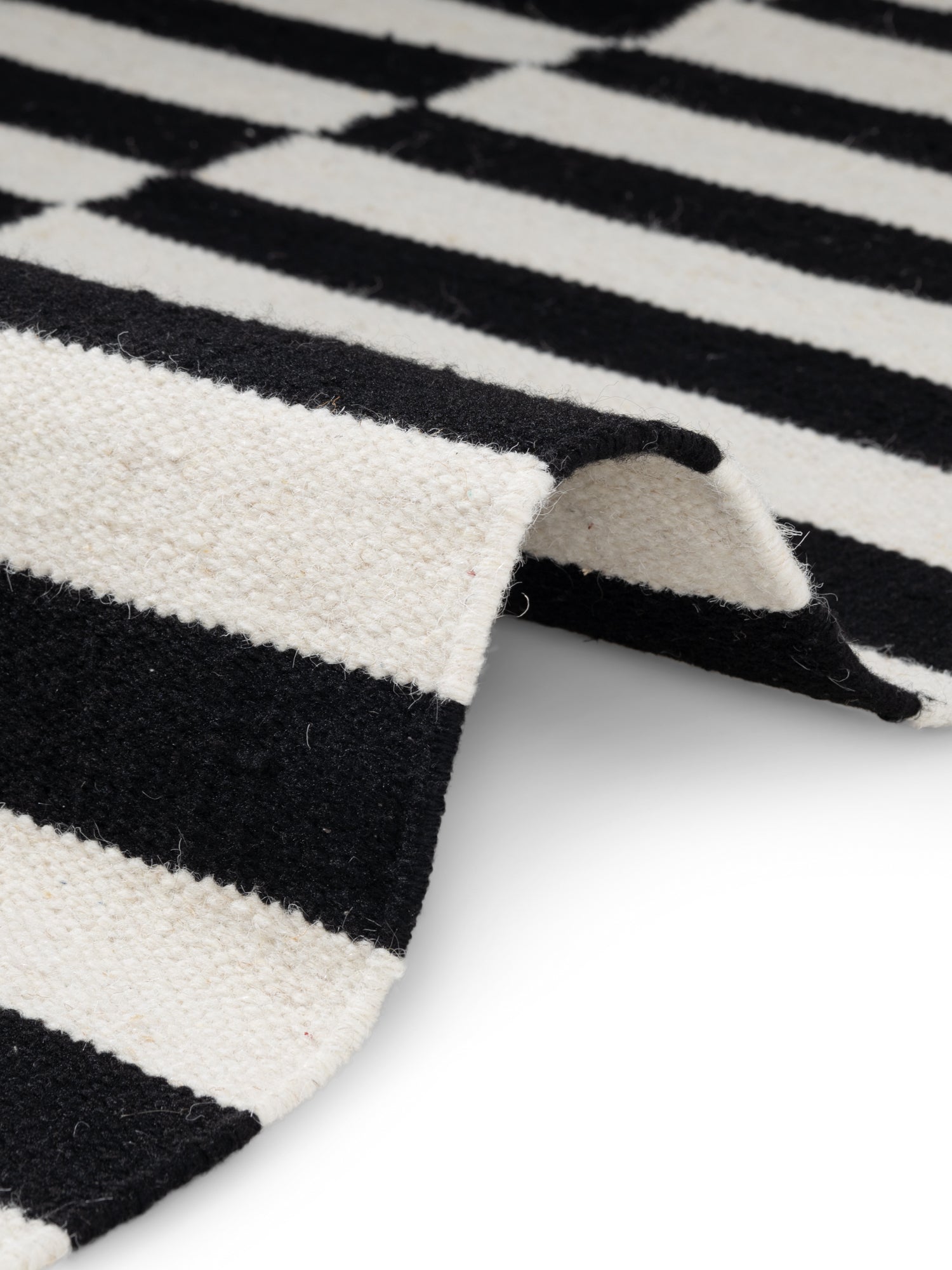 DONA ULD TÆPPE, SORT-NATURLIG HVID 106207