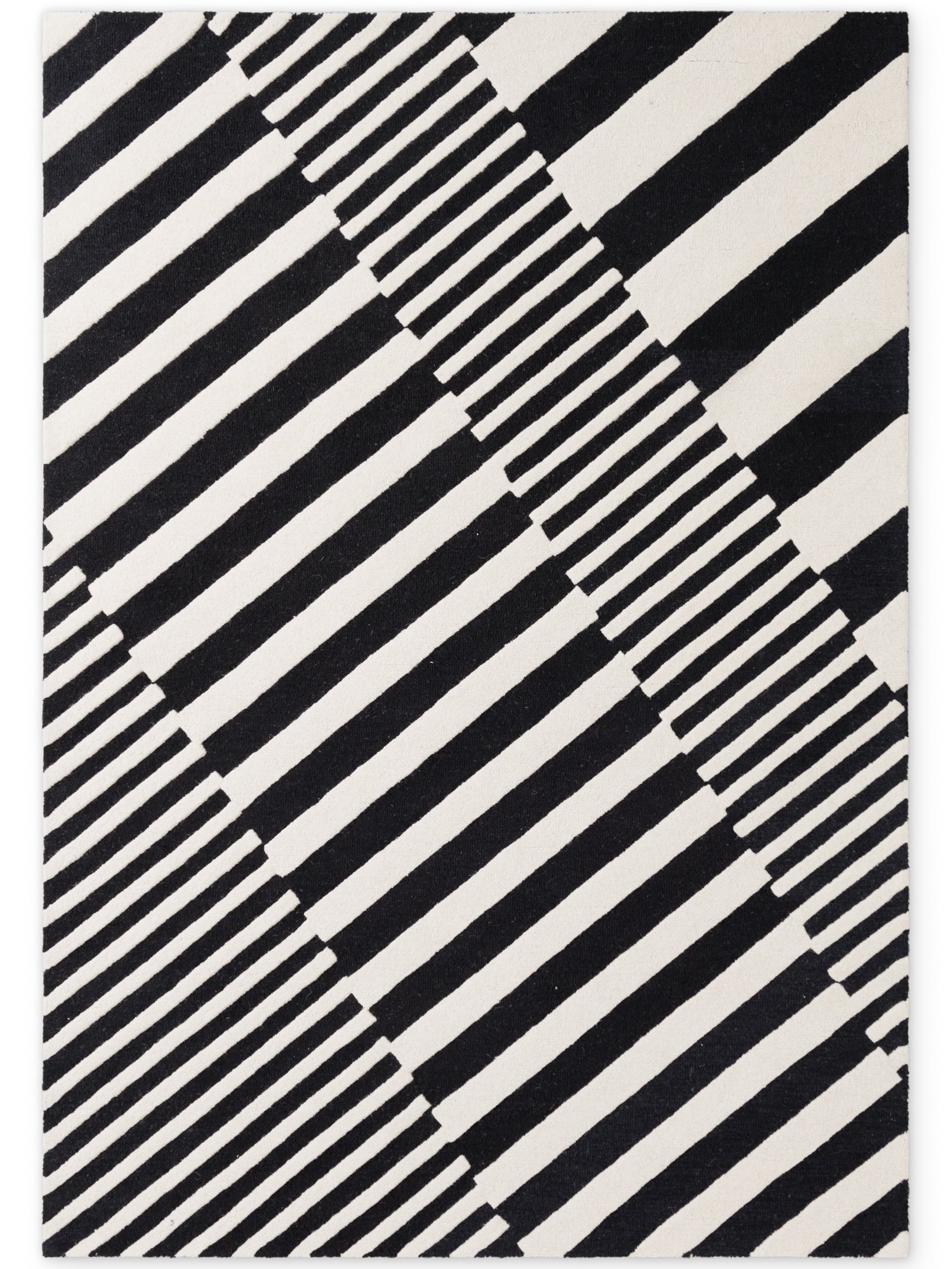 ELLE DECORATION STRYVE ULDTÆPPE FLUX, SORT-HVID